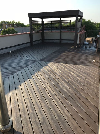 chicago rooftop deck with pergola staining